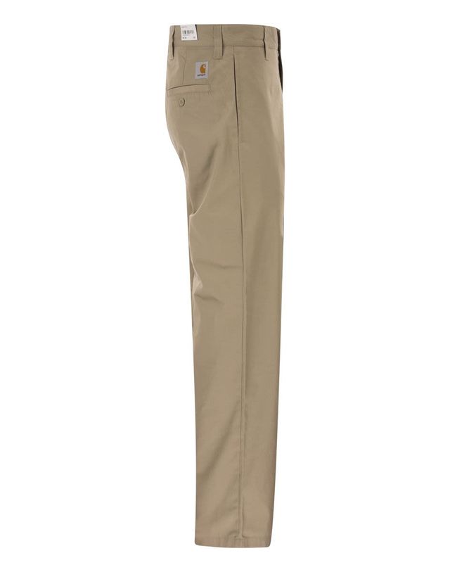 칼하트 [해외직구] 26SS CARHARTT 플레어 팬츠 in 베이지 코튼 with 로고 I0361323IRXX TP574368215 착용컷