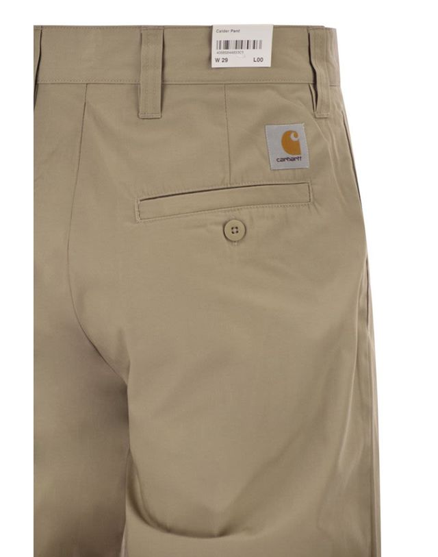 칼하트 [해외직구] 26SS CARHARTT 플레어 팬츠 in 베이지 코튼 with 로고 I0361323IRXX TP574368215 착용컷