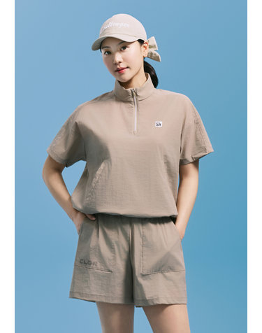 [온라인단독] [챌린저] 여성 경량 하이넥 반집업 반팔 우븐탑 베이지