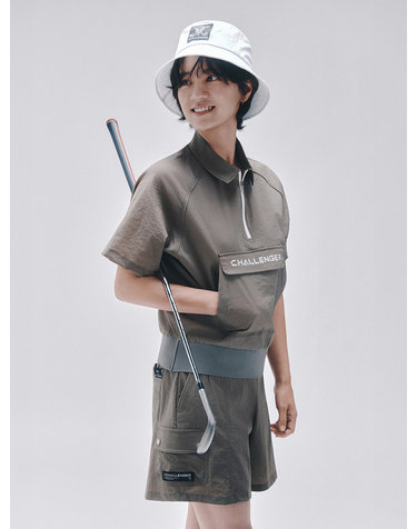 여성 모노엣지 지퍼 카라 반팔 우븐탑 카키베이지