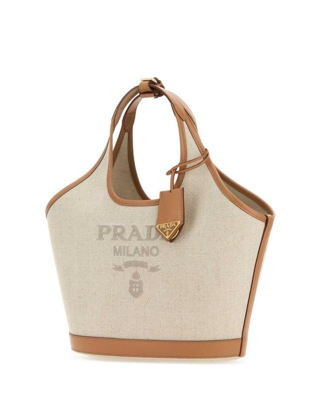 프라다 [해외직구] 25SS 프라다 토트백 1BG471VOAH2DLI F0018 BEIGE O TAN 착용컷