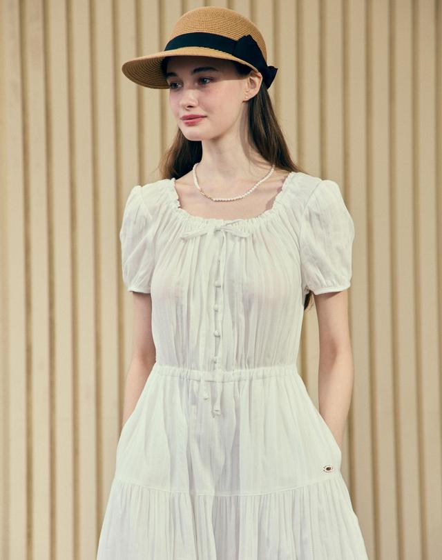 논로컬 Ribbon Rattan Sun Visor Hat - Beige 착용컷