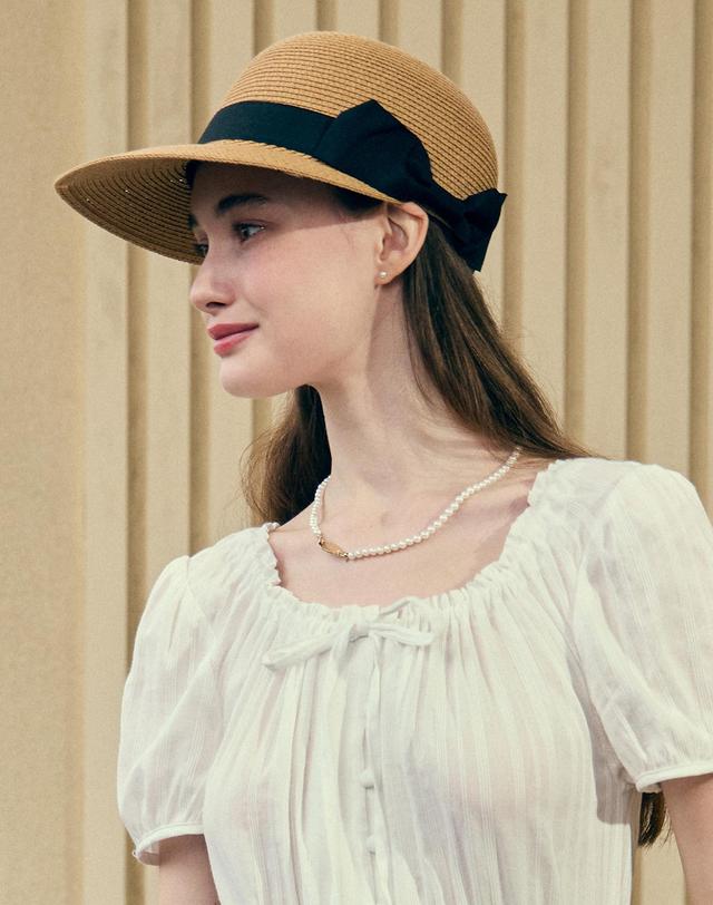논로컬 Ribbon Rattan Sun Visor Hat - Beige 착용컷